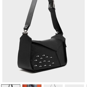 Min & Mon New York Black Leather “Houston” Bag with embroidered eye detail.